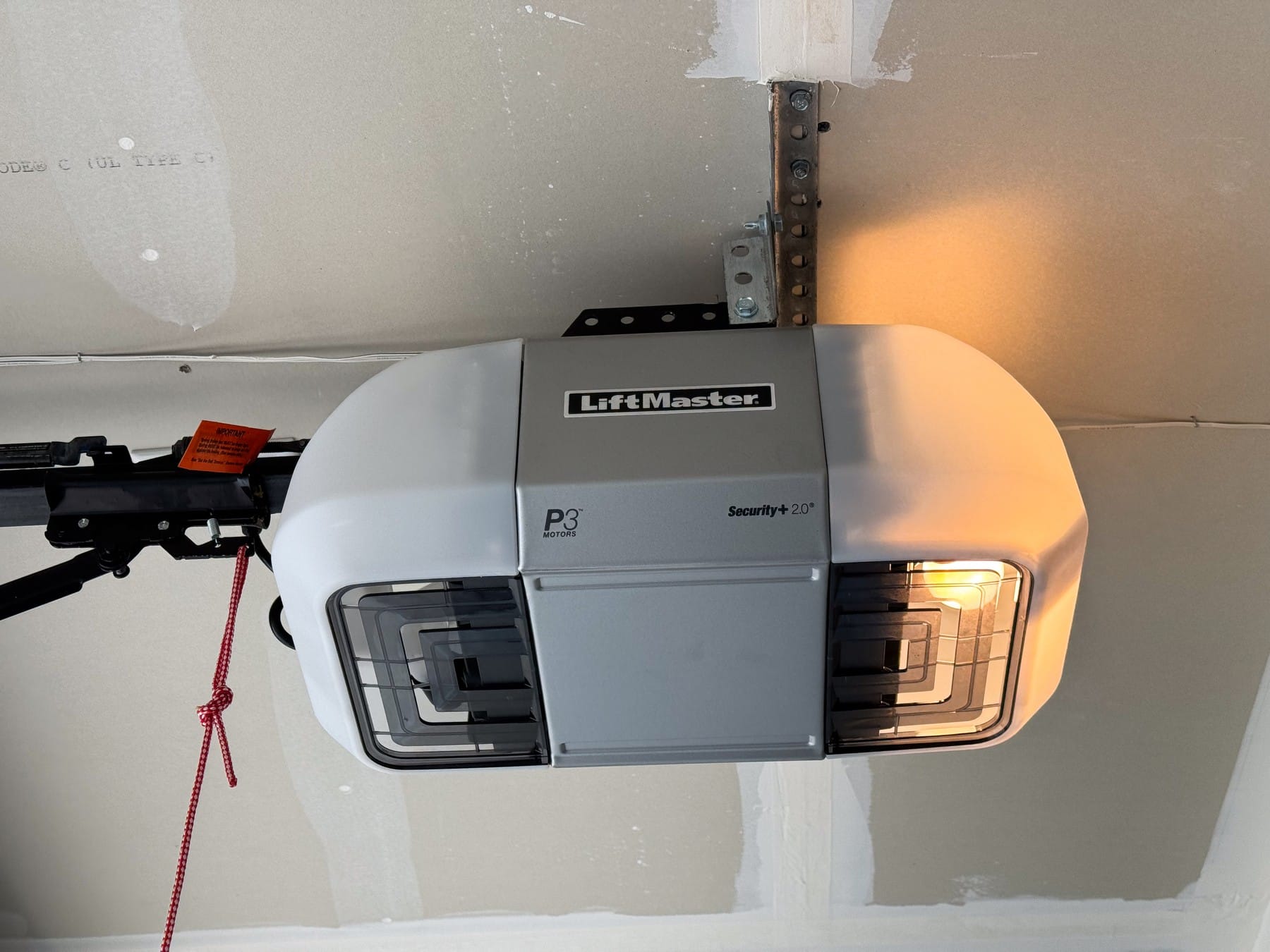 Garage door opener with light